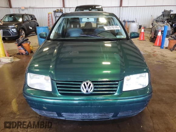 1999 Volkswagen Jetta GL z VIN 3VWRC29M2XM094970, wystawiony jako Copart lot #52618145 z przebiegiem Nie podano mil oraz Szkoda całkowita • Salvage title. Historia ofert i sprzedaży dostępna na DreamBid. Obrazek 5.