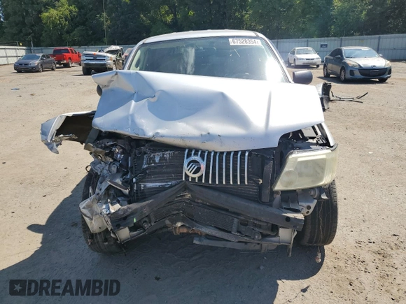 2005 Mercury Mariner Luxury z VIN 4M2YU56165DJ21260, wystawiony jako Copart lot #67528354 z przebiegiem Nie podano mil oraz Szkoda całkowita • Salvage title. Historia ofert i sprzedaży dostępna na DreamBid. Obrazek 5.