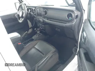 2023 Jeep Gladiator Overland with VIN 1C6HJTFG7PL543870, listed as a IAAI auction lot 42056969 with 28,655 mi miles and . Bid and sale history available at DreamBid. Image 5.