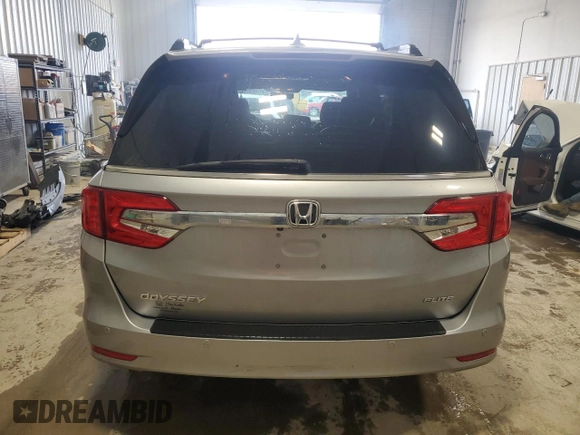 2018 Honda Odyssey Elite с VIN 5FNRL6H98JB036459, выставлен на аукционе Copart как лот 54231155 с пробегом 54 818 миль миль и Списание • Salvage title. История ставок и продаж доступна на DreamBid. Изображение 6.