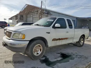 2003 Ford F-150 XL z VIN 2FTRX17233CA07764, wystawiony jako Copart lot #66994195 z przebiegiem Nie podano mil oraz Czysty tytuł • Clean title. Historia ofert i sprzedaży dostępna na DreamBid. Obrazek 1.