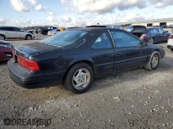 1996 Ford Thunderbird LX z VIN 1FALP62W1TH162826, wystawiony jako Copart lot #87037034 z przebiegiem 181 379 mil mil oraz Czysty tytuł • Clean title. Historia ofert i sprzedaży dostępna na DreamBid. Obrazek 3.