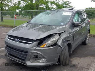 2013 Ford Escape SEL z VIN 1FMCU9H96DUC66206, wystawiony jako IAAI lot #42376442 z przebiegiem 96 776 mil mil oraz . Historia ofert i sprzedaży dostępna na DreamBid. Obrazek 17.