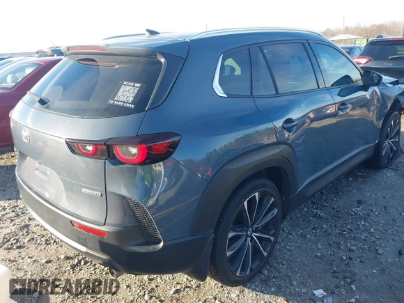 2023 Mazda CX-50 S Premium Plus with VIN 7MMVABEM2PN102083, listed as a IAAI auction lot 41589242 with 75,373 mi miles and . Bid and sale history available at DreamBid. Image 4.