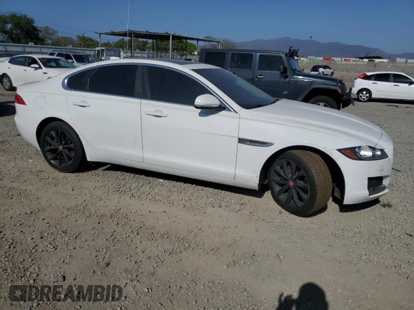 2017 Jaguar XF with VIN SAJBJ4BNXHCY32012, listed as a Copart auction lot 53871255 with 112,204 mi miles and Salvage Title. Bid and sale history available at DreamBid. Image 4.