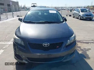 2009 Toyota Corolla with VIN 1NXBU40E19Z143959, listed as a IAAI auction lot 42032312 with 155,776 mi miles. Bid and sale history available at carsss.com. Image 12.