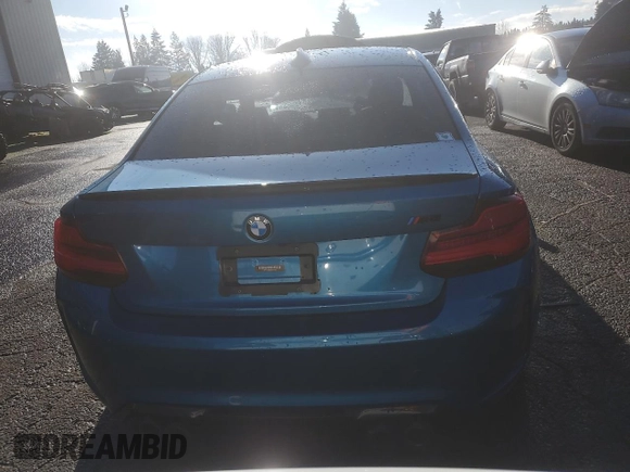 2018 BMW M2 z VIN WBS1J5C59JVD36008, wystawiony jako Copart lot #87876685 z przebiegiem 24 255 mil mil oraz Szkoda całkowita • Salvage title. Historia ofert i sprzedaży dostępna na DreamBid. Obrazek 6.