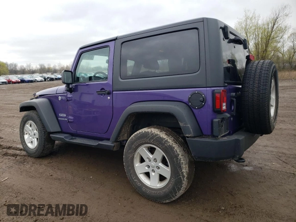 2017 Jeep Wrangler Willys Wheeler with VIN 1C4AJWAG0HL641188, listed as a Copart auction lot 52814005 with 94,959 mi miles and Salvage Title. Bid and sale history available at DreamBid. Image 2.