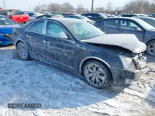 2011 Cadillac CTS Premium with VIN 1G6DS5EDXB0167881, listed as a IAAI auction lot 41391251 with 113,829 mi miles. Bid and sale history available at carsss.com. Image 1.