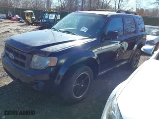 2009 Ford Escape XLT with VIN 1FMCU93G59KB55025, listed as a IAAI auction lot 41756362 with 999,999 mi miles. Bid and sale history available at carsss.com. Image 2.