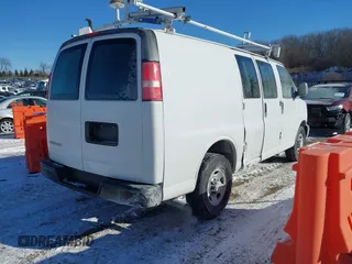 2019 Chevrolet Express Cargo Van with VIN 1GCWGAFP2K1165836, listed as a IAAI auction lot 41413698 with 139,469 mi miles. Bid and sale history available at carsss.com. Image 4.