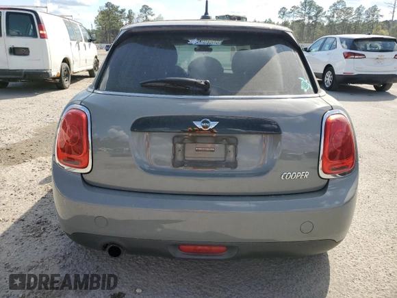 2016 MINI Hardtop 4 Door with VIN WMWXU1C55G2D09641, listed as a Copart auction lot 50567495 with 123,796 mi miles and Salvage Title. Bid and sale history available at DreamBid. Image 6.