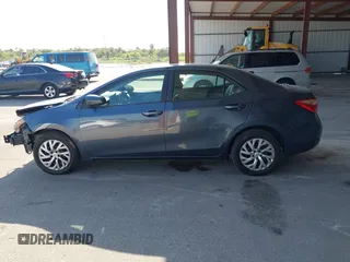 2019 Toyota Corolla L z VIN 2T1BURHE7KC183584, wystawiony jako IAAI lot #42302045 z przebiegiem 110 845 mil mil oraz . Historia ofert i sprzedaży dostępna na DreamBid. Obrazek 14.