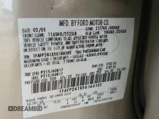 2005 Ford Five Hundred SEL with VIN 1FAFP241X5G160105, listed as a Copart auction lot 79487914 with 0 mi miles and Salvage Title. Bid and sale history available at carsss.com. Image 14.
