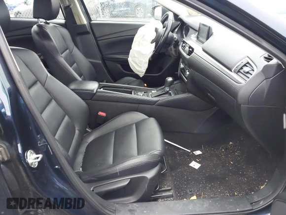 2017 Mazda Mazda6 Touring with VIN JM1GL1V59H1154440, listed as a IAAI auction lot 41078595 with 104,732 mi miles. Bid and sale history available at carsss.com. Image 5.
