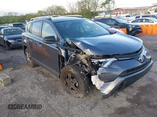 2016 Toyota RAV4 LE with VIN JTMBFREV1GD187414, listed as a IAAI auction lot 42033130 with 123,955 mi miles and . Bid and sale history available at carsss.com. Image 1.