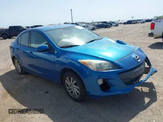 2012 Mazda Mazda3 i Touring with VIN JM1BL1V74C1672668, listed as a IAAI auction lot 41729364 with 154,902 mi miles. Bid and sale history available at carsss.com. Image 1.