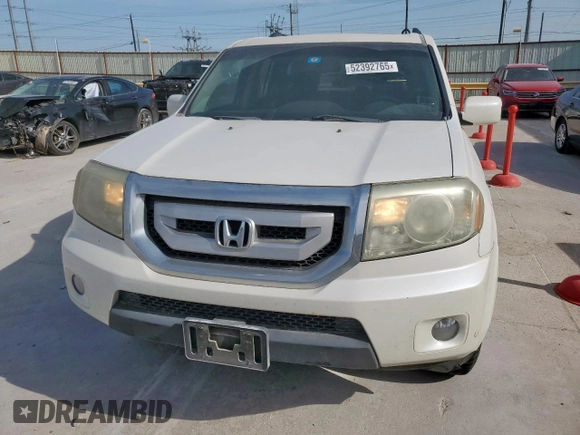 2011 Honda Pilot Touring z VIN 5FNYF3H98BB005411, wystawiony jako Copart lot #52392765 z przebiegiem 155 541 mil mil oraz Szkoda całkowita • Salvage title. Historia ofert i sprzedaży dostępna na DreamBid. Obrazek 5.