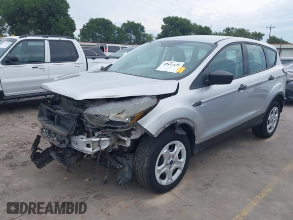 2018 Ford Escape S with VIN 1FMCU0F75JUA54972, listed as a IAAI auction lot 42482629 with 90,458 mi miles and . Bid and sale history available at DreamBid. Image 2.