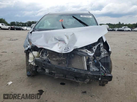 2015 Toyota Sienna XLE с VIN 5TDYK3DC1FS541180, выставлен на аукционе Copart как лот 59078585 с пробегом 94 014 миль миль и Списание • Salvage title. История ставок и продаж доступна на DreamBid. Изображение 5.