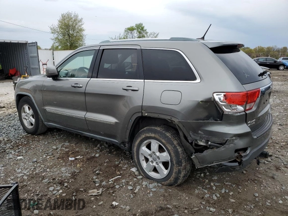 2011 Jeep Grand Cherokee Laredo with VIN 1J4RR4GG7BC578129, listed as a Copart auction lot 53147775 with 157,127 mi miles and Salvage title. Bid and sale history available at DreamBid. Image 2.