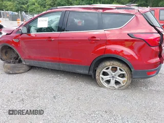 2019 Ford Escape Titanium with VIN 1FMCU9J97KUC08287, listed as a IAAI auction lot 42702548 with 45,207 mi miles and . Bid and sale history available at DreamBid. Image 14.