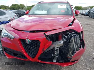 2018 Alfa Romeo Stelvio Sport z VIN ZASFAKPN0J7B61761, wystawiony jako IAAI lot #41144776 z przebiegiem 34 314 mil mil oraz . Historia ofert i sprzedaży dostępna na DreamBid. Obrazek 6.