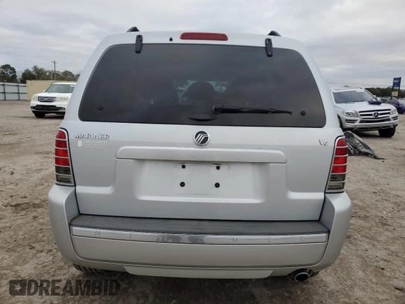 2005 Mercury Mariner Luxury z VIN 4M2CU56175DJ15493, wystawiony jako Copart lot #87480494 z przebiegiem 73 321 mil mil oraz Czysty tytuł • Clean title. Historia ofert i sprzedaży dostępna na DreamBid. Obrazek 6.