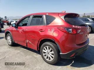 2014 Mazda CX-5 Touring with VIN JM3KE2CY9E0356050, listed as a Copart auction lot 65470674 with 70,400 mi miles and Salvage Title. Bid and sale history available at DreamBid. Image 2.