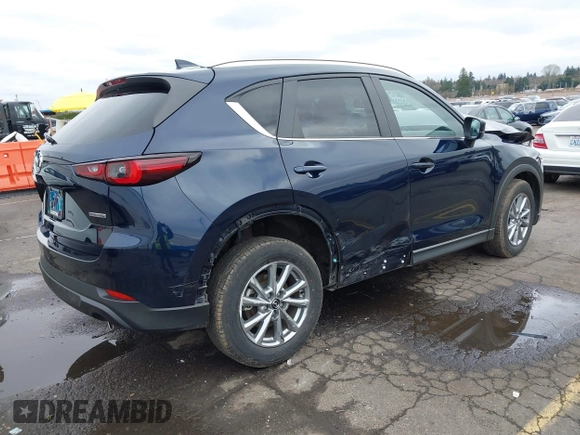 2022 Mazda CX-5 2.5 S Preferred Package with VIN JM3KFBCM6N0602773, listed as a IAAI auction lot 41762571 with 49,121 mi miles. Bid and sale history available at carsss.com. Image 4.