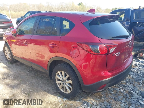 2015 Mazda CX-5 Touring with VIN JM3KE4CY1F0510361, listed as a IAAI auction lot 42134415 with 95,907 mi miles and . Bid and sale history available at carsss.com. Image 3.
