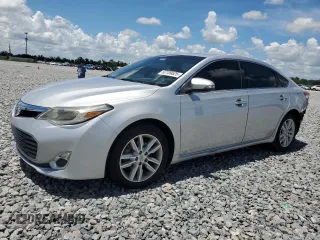 2013 Toyota Avalon XLE with VIN 4T1BK1EB6DU037938, listed as a Copart auction lot 62709525 with 104,616 mi miles and Salvage title. Bid and sale history available at DreamBid. Image 1.