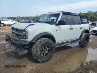 2021 Ford Bronco с VIN 1FMDE5BHXMLA96979, выставлен на аукционе Copart как лот 57878665 с пробегом 20 893 миль миль и Списание • Salvage title. История ставок и продаж доступна на DreamBid. Изображение 1.