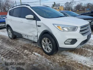 2018 Ford Escape SE with VIN 1FMCU0GD1JUC48757, listed as a IAAI auction lot 41631583 with 80,700 mi miles. Bid and sale history available at carsss.com. Image 1.