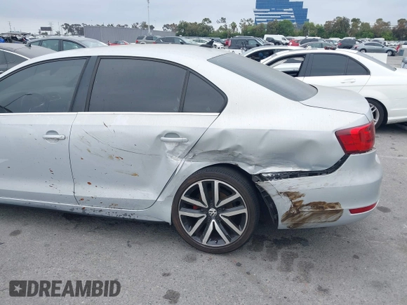 2012 Volkswagen Jetta GLI Autobahn with VIN 3VW4A7AJ1CM450205, listed as a IAAI auction lot 42421504 with 130,602 mi miles and . Bid and sale history available at DreamBid. Image 6.