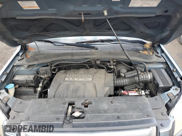 2007 Honda Pilot EX-L with VIN 2HKYF18507H528092, listed as a Copart auction lot 61456745 with 251,496 mi miles and Salvage title. Bid and sale history available at DreamBid. Image 12.