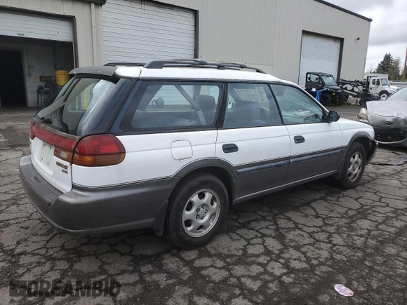 1996 Subaru Legacy Outback with VIN 4S3BG6850T7971454, listed as a Copart auction lot 52082395 with 173,542 mi miles and Salvage title. Bid and sale history available at DreamBid. Image 3.