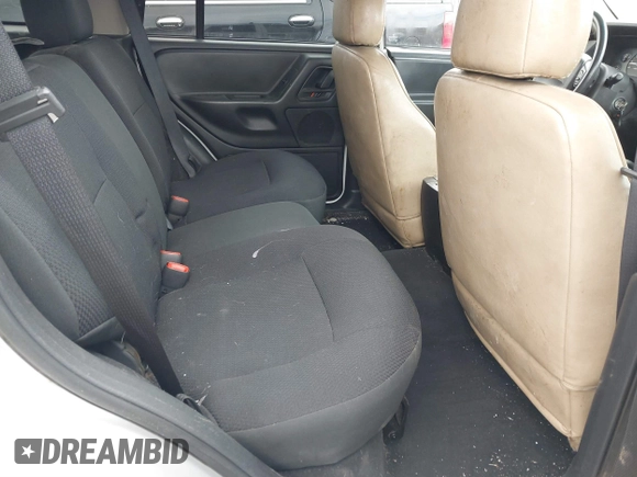 2004 Jeep Grand Cherokee Laredo with VIN 1J4GW48N14C434351, listed as a IAAI auction lot 41860077 with 152,404 mi miles and . Bid and sale history available at DreamBid. Image 8.