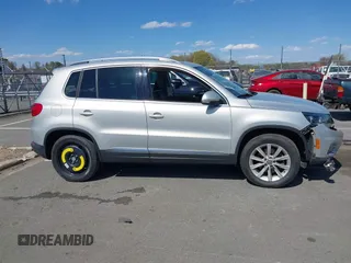 2015 Volkswagen Tiguan SE with VIN WVGAV7AX0FW544218, listed as a IAAI auction lot 41897418 with 97,235 mi miles and . Bid and sale history available at DreamBid. Image 14.