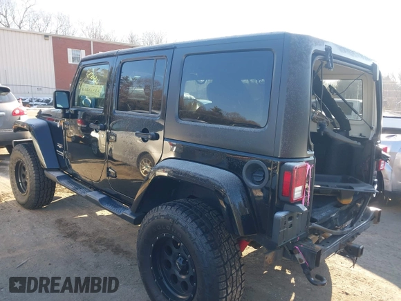 2018 Jeep Wrangler JK Unlimited Sahara with VIN 1C4HJWEG8JL921293, listed as a IAAI auction lot 41413264 with 90,566 mi miles. Bid and sale history available at carsss.com. Image 3.