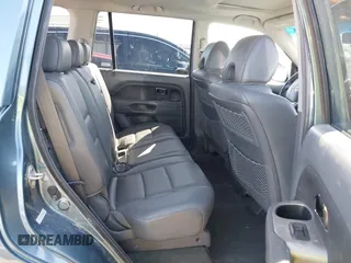 2007 Honda Pilot EX-L with VIN 5FNYF18517B028036, listed as a IAAI auction lot 41860675 with 61,217 mi miles and . Bid and sale history available at DreamBid. Image 8.