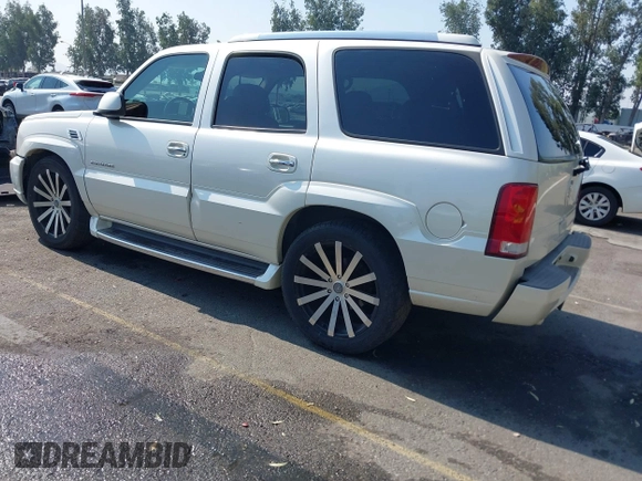 2004 Cadillac Escalade with VIN 1GYEC63T74R310907, listed as a IAAI auction lot 42747095 with 165,755 mi miles and . Bid and sale history available at DreamBid. Image 3.