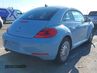 2014 Volkswagen Beetle 2.5L w/Sun with VIN 3VWJP7AT6EM601318, listed as a IAAI auction lot 41902598 with 169,220 mi miles and . Bid and sale history available at DreamBid. Image 4.
