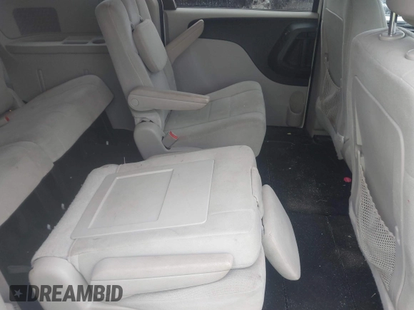 2012 Dodge Grand Caravan SXT with VIN 2C4RDGCG4CR304472, listed as a IAAI auction lot 41396437 with 180,309 mi miles and . Bid and sale history available at DreamBid. Image 8.