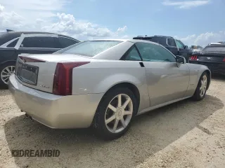 2006 Cadillac XLR z VIN 1G6YV36A365601441, wystawiony jako Copart lot #73945994 z przebiegiem Nie podano mil oraz Szkody całkowita. Historia ofert i sprzedaży dostępna na DreamBid. Obrazek 3.