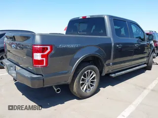 2019 Ford F-150 XL with VIN 1FTEW1C44KKE81550, listed as a IAAI auction lot 42012568 with 53,978 mi miles and . Bid and sale history available at carsss.com. Image 4.