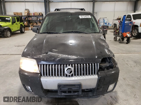 2005 Mercury Mariner Luxury z VIN 4M2YU57145DJ26214, wystawiony jako Copart lot #42154255 z przebiegiem Nie podano mil oraz Tytuł czysty. Historia ofert i sprzedaży dostępna na DreamBid. Obrazek 5.