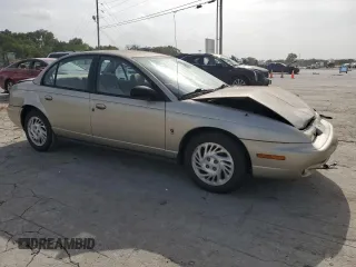 1998 Saturn SL with VIN 1G8ZK5270WZ240303, listed as a Copart auction lot 65364164 with 156,699 mi miles and Salvage title. Bid and sale history available at DreamBid. Image 4.