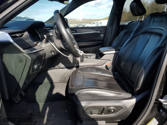 2021 Jeep Grand Cherokee L Overland with VIN 1C4RJKDG2M8129856, listed as a Copart auction lot 44390765 with 27,502 mi miles and Salvage Title. Bid and sale history available at carsss.com. Image 7.