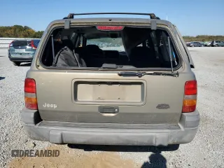 1998 Jeep Grand Cherokee Laredo with VIN 1J4GZ58S5WC165213, listed as a Copart auction lot 77611434 with 168,688 mi miles and Salvage Title. Bid and sale history available at carsss.com. Image 6.